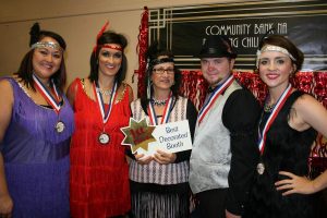 Members of the “Roaring Chili” team from Community Bank NA won the award for best decorated booth.