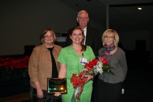 Gina Ross (front,center), Texas County Memorial Hospital 2013 employee of the year with (left to right), Doretta Todd-Willis, chief nursing officer; Wes Murray, chief executive officer, and Linda Pamperien, chief financial officer.