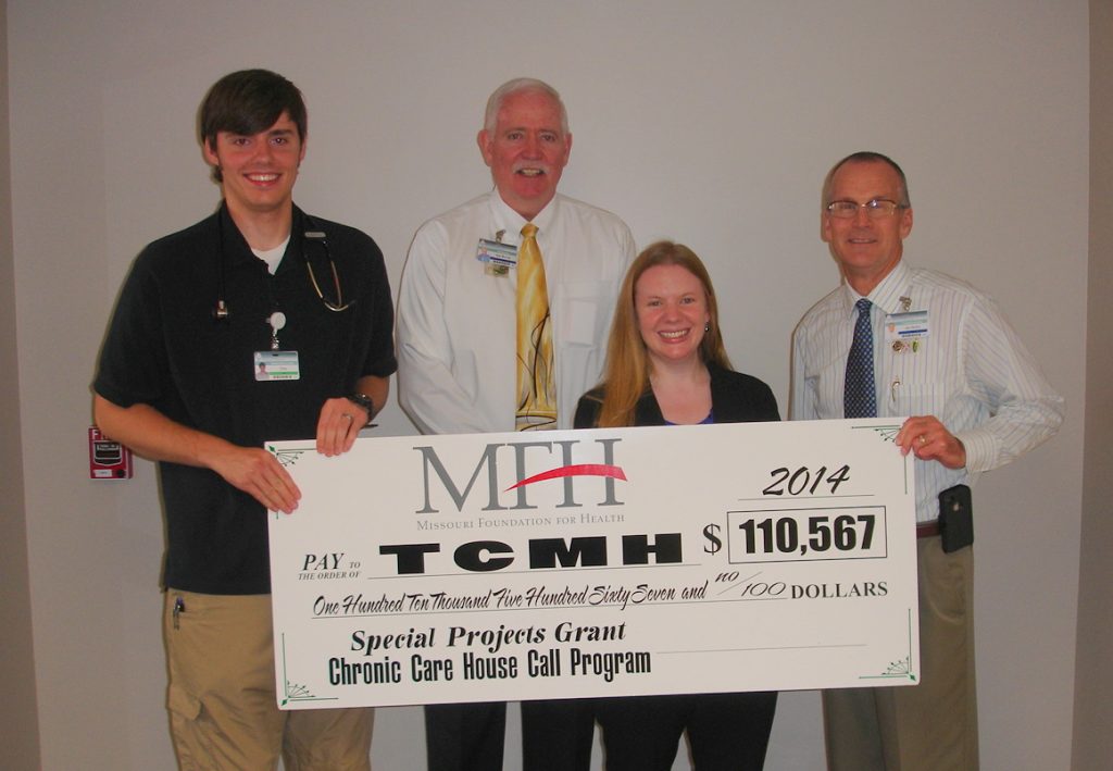 Jean Freeman-Crawford, program officer for the Missouri Foundation for Health, presented a ceremonial check to Texas County Memorial Hospital for the house call grant for chronically ill patients. Shown with the check are (left to right) Chip Lange, physician assistant at TCMH; Wes Murray, TCMH CEO; Freeman-Crawford, and Jay Gentry, TCMH Healthcare Foundation director.