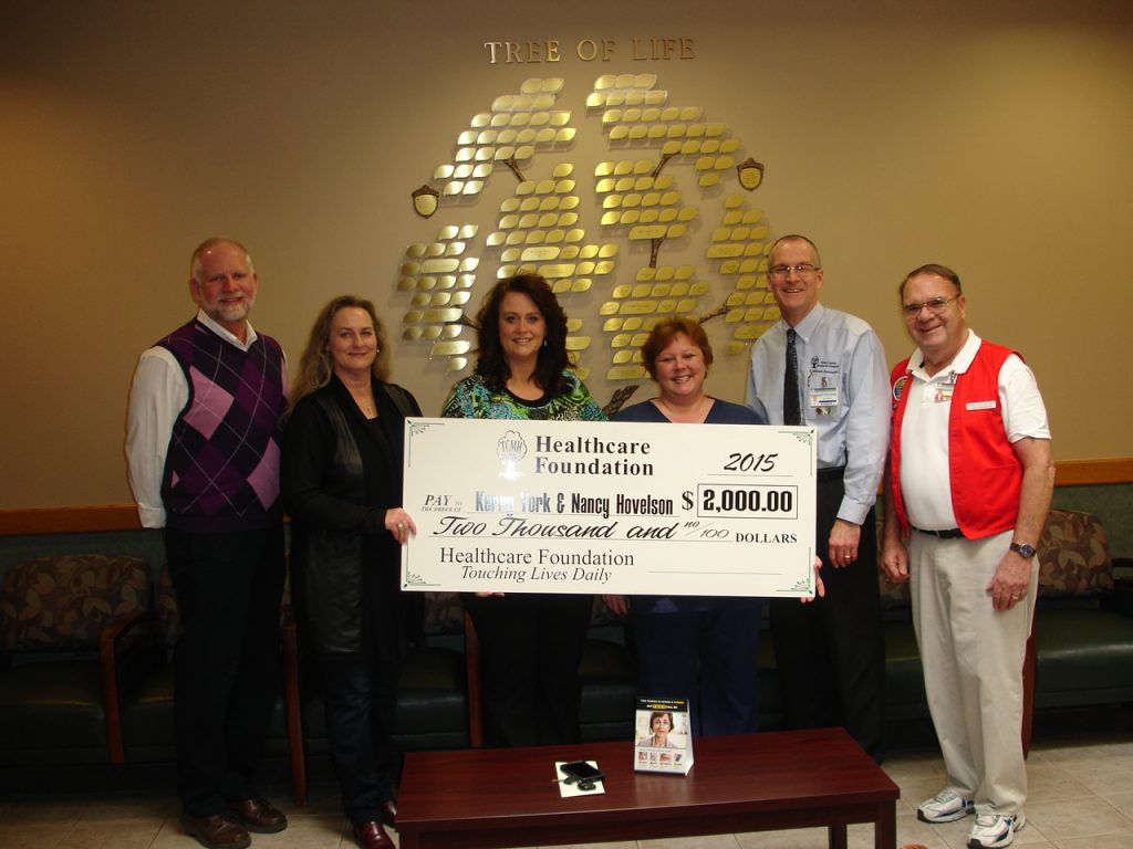 The Texas County Memorial Hospital Healthcare Foundation gave two $1,000 scholarships to area students, Kerry York and Nancy Hovelson this week. Shown at the presentation are: Jim Bukowsky and Donna Jones, Healthcare Foundation board members, York and Hovelson, Jay Gentry, Healthcare Foundation director, and Reese Bucher, Healthcare Foundation board member.