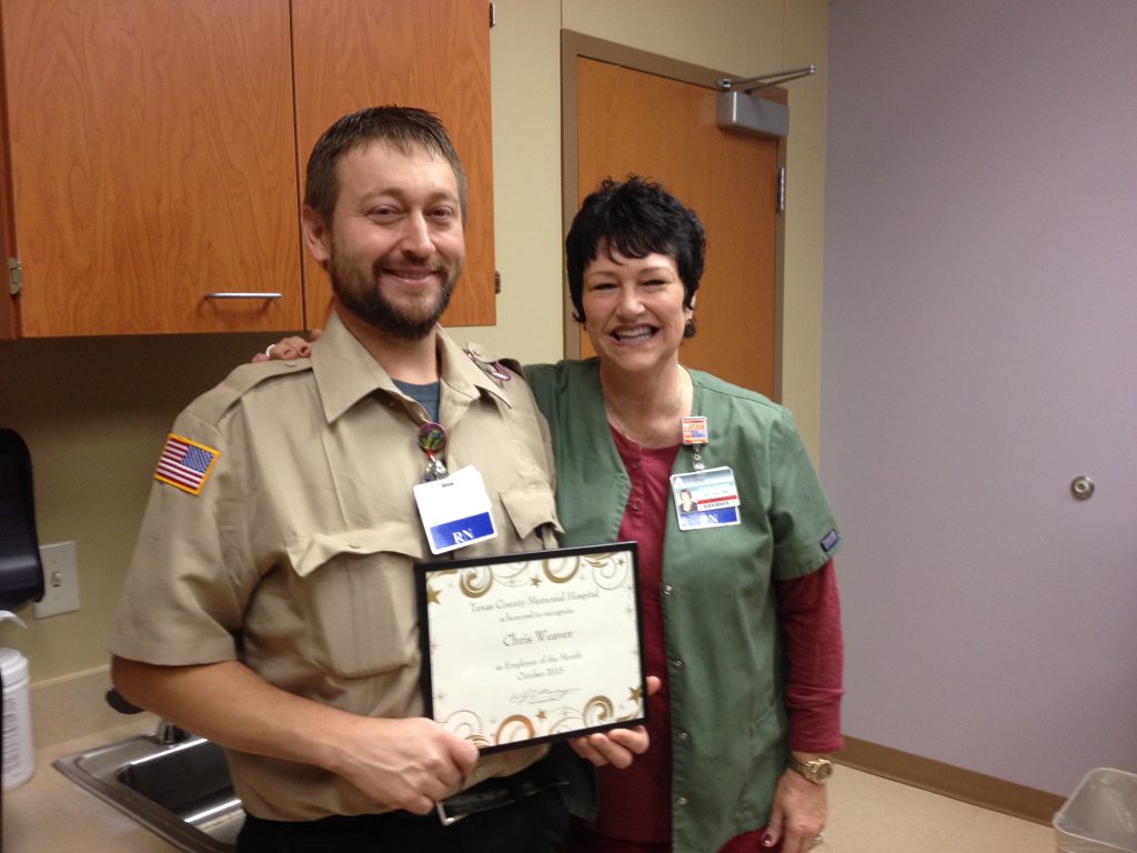 Chris Weaver, October employee of the month, with his supervisor, Jerri Sue Crump.