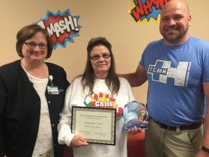 Modena Jones (center) Texas County Memorial Hospital CNA of the year, with Doretta Todd-Willis (left), TCMH chief nursing officer, and John Sawyer, medical surgical department manager. 