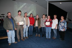 Plant Operations and Home Health of the Ozarks won the customer service departments of the year award at Texas County Memorial Hospital. Members of both departments are here accepting the award.